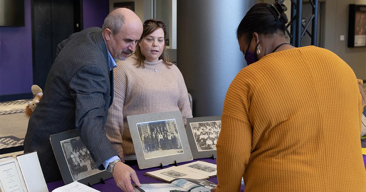 University Archivist Volodymyr Chumachenko and Graduate Assistant Dixie Norwood shares Founders' Day materials with students, faculty, and staff at the 2022 Founders' Day celebration.